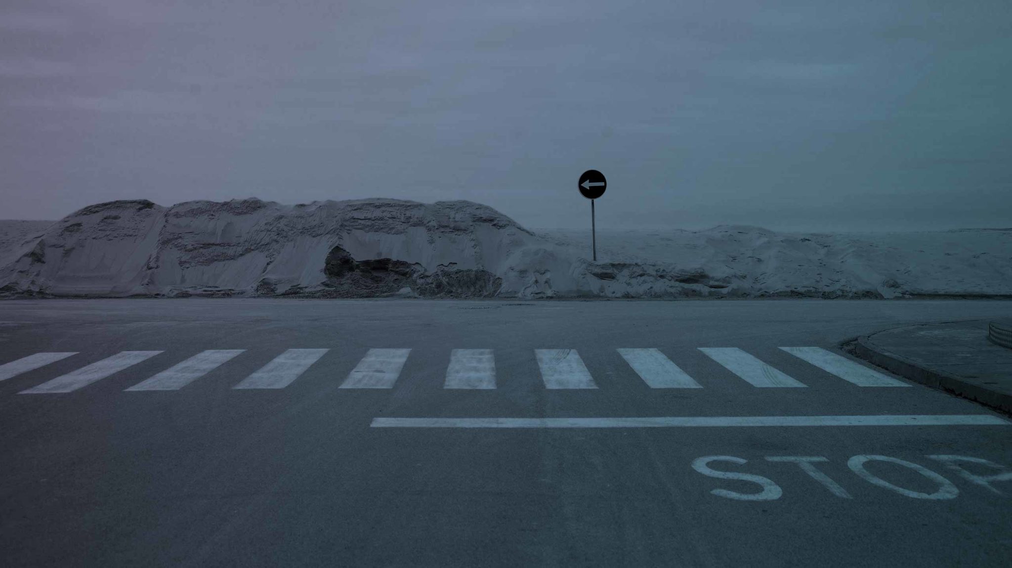 crosswalk on empty coastal road