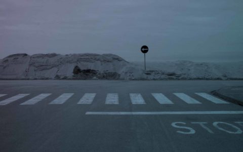 crosswalk on empty coastal road