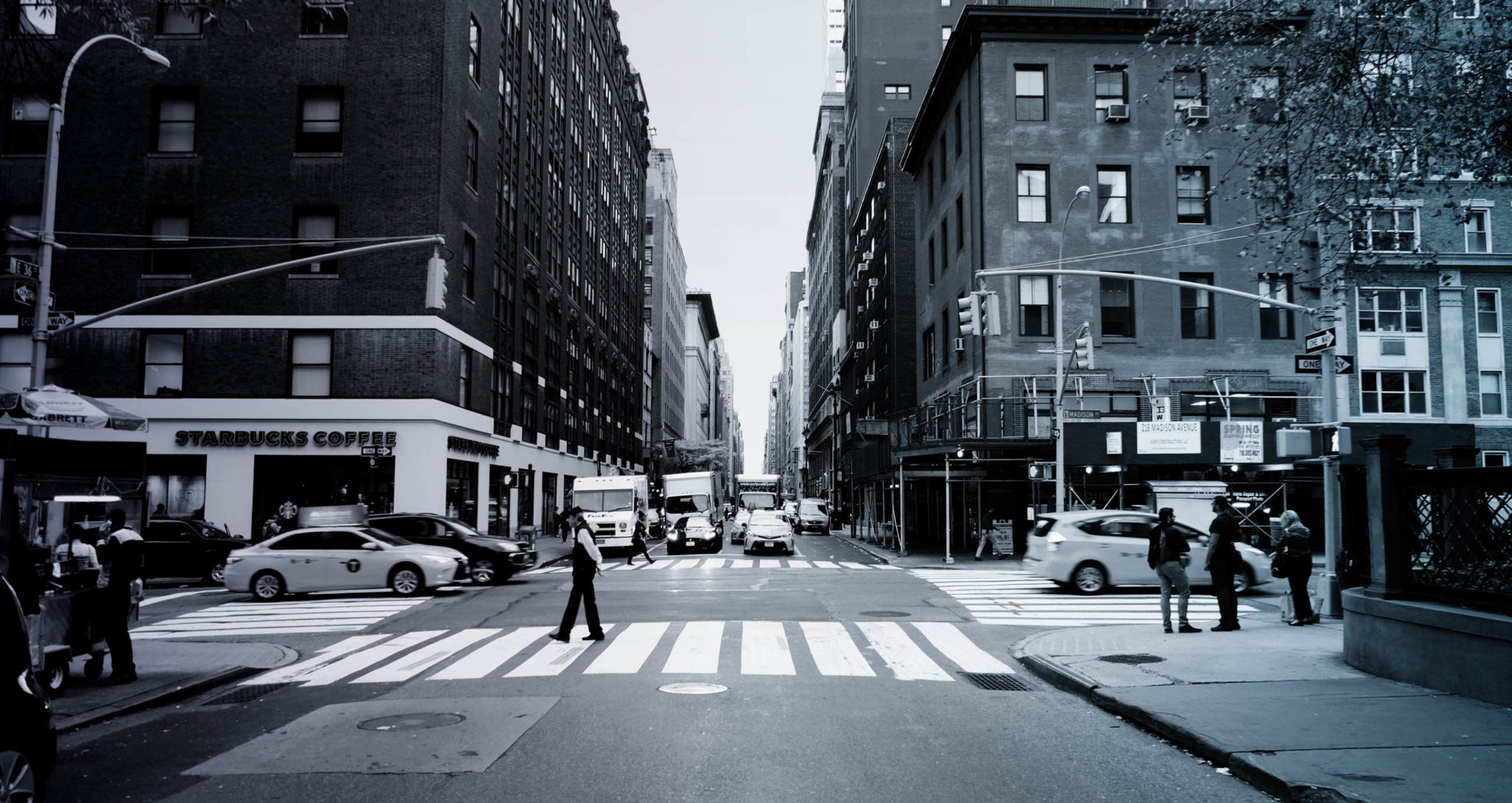 person on crosswalk on city street