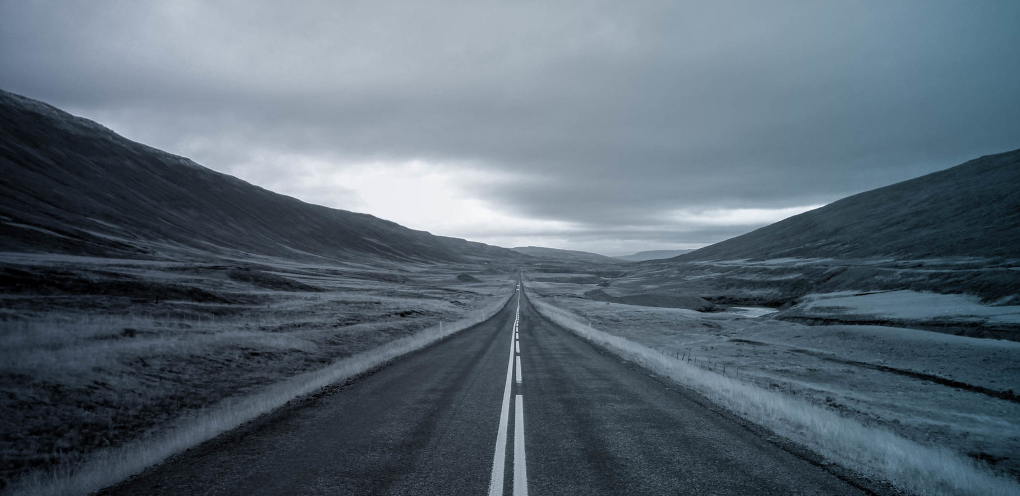 empty rural highway with hills