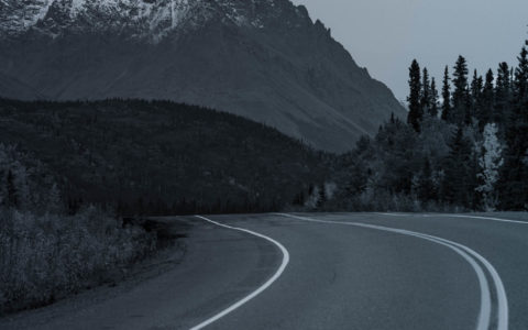 empty highway with mountain