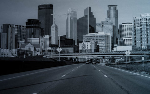 road with city in the distance